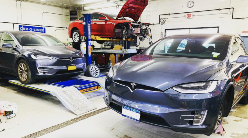 Teslas being repaired at GM service center; via TeslaRepairs (Insta)