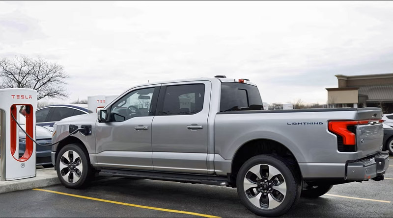 Ford F150 Lightning Charging at Tesla Supercharger. February, 2024.