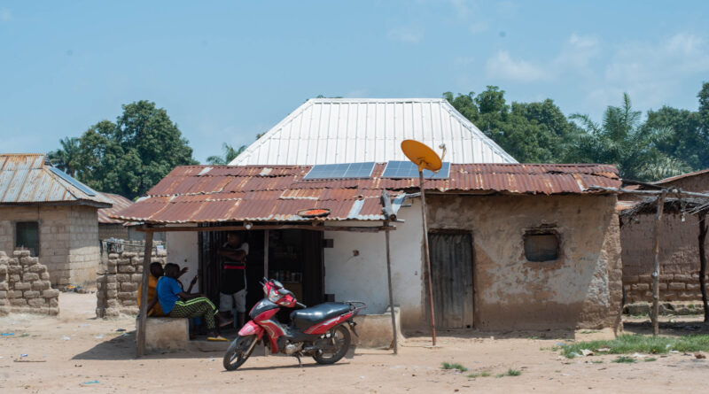 Household in Nigeria with panels installed on the roof as part of the mesh-grid.