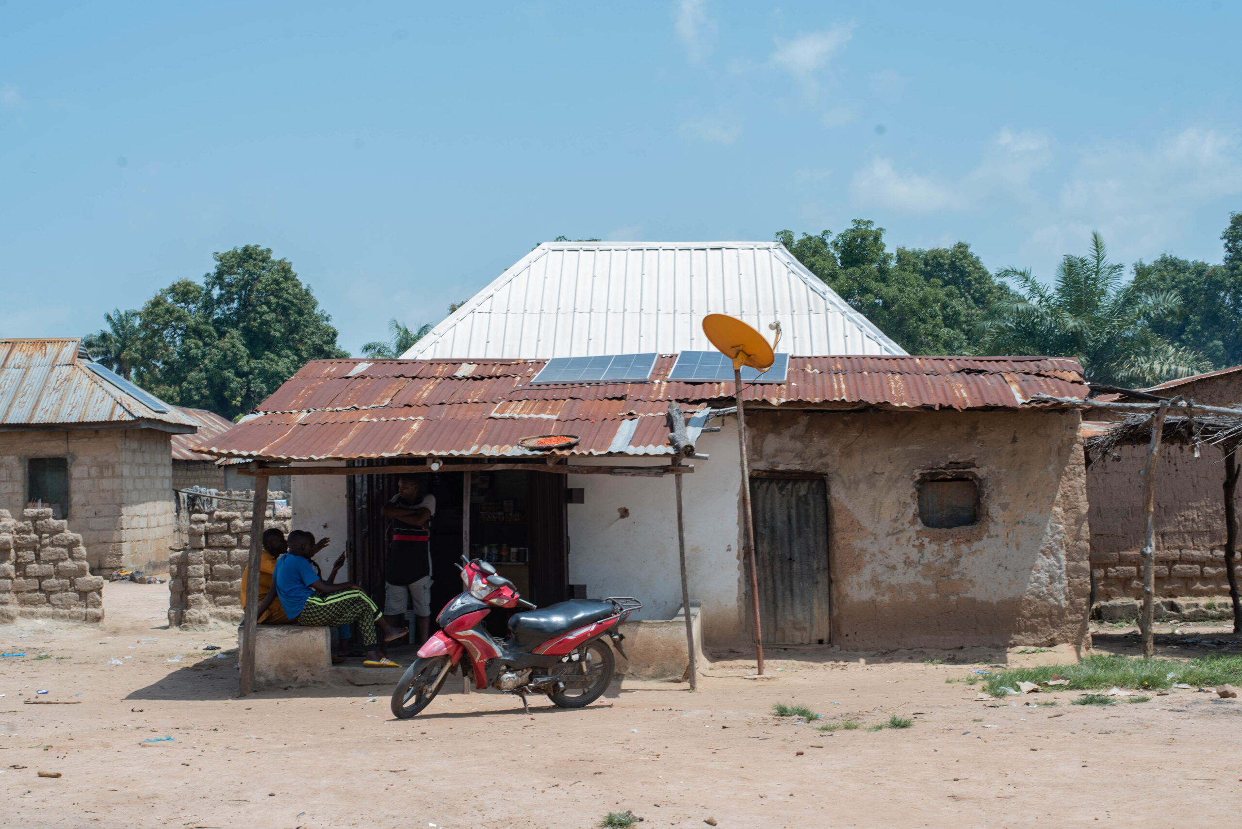 Household in Nigeria with panels installed on the roof as part of the mesh-grid. 