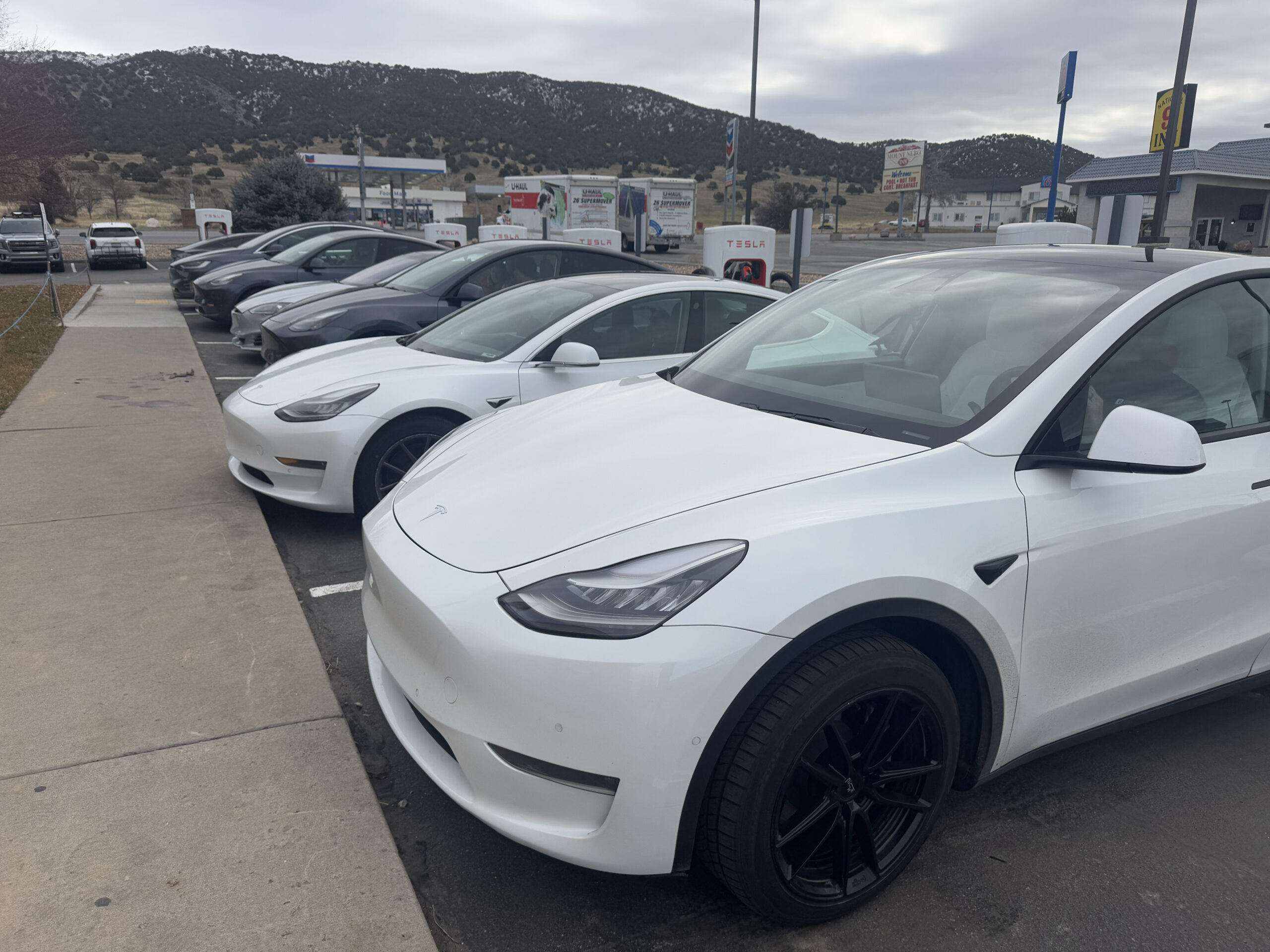 9460 7 of 8 drive through supercharging stalls full. Tesla NACS Supercharger. Nina Utah. January 1 2024. Photo by Fritz Hasler scaled